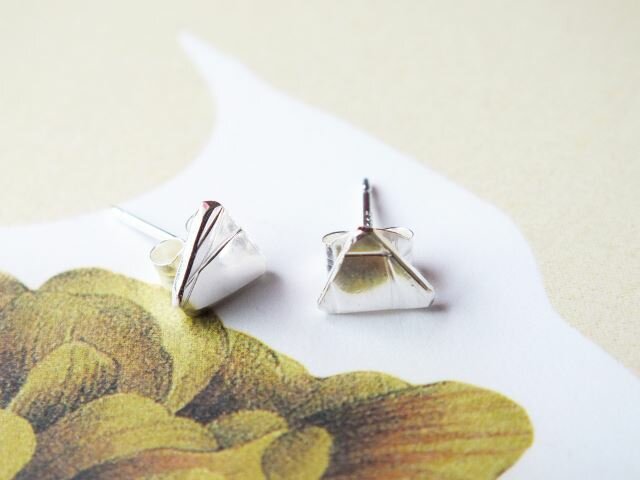 Silver textured triangle studs, $36 by Copper Kowhai