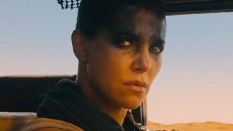 charlize-theron-mad-max-fury-road-trailer-comic-con