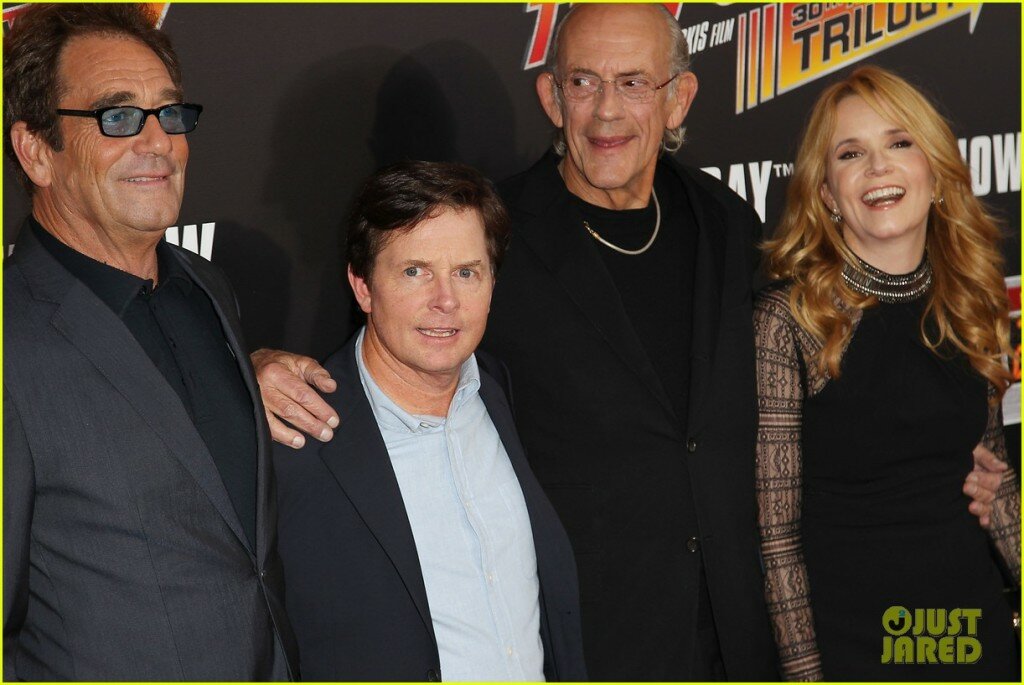 - New York, NY - 10/21/15 - Cast and filmmakers to attend celebration of the Back To The Future 30th Anniversary Trilogy. -PICTURED: Huey Lewis, Michael J. Fox, Christopher Lloyd and Lea Thompson -PHOTO by: Matthew Taplinger/Starpix -FILENAME: MT_15_000376.JPG -Location: AMC Loews Lincoln Square 13 Startraks Photo New York, NY For licensing please call  or email  Image may not be published in any way that is or might be deemed defamatory, libelous, pornographic, or obscene. Please consult our sales department for any clarification or question you may have. Startraks Photo reserves the right to pursue unauthorized users of this image. If you violate our intellectual property you may be liable for actual damages, loss of income, and profits you derive from the use of this image, and where appropriate, the cost of collection and/or statutory damages.