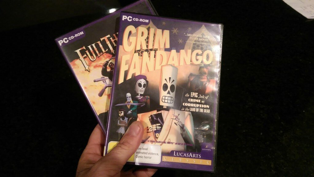 Oh, hey, look, it's disc copies of Full Throttle and Grim Fandango. I'm holding them. 